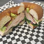 Turkey piled high on our Club bagel sandwich. Come and get it at Parallon (525 Metroplex Dr) serving...